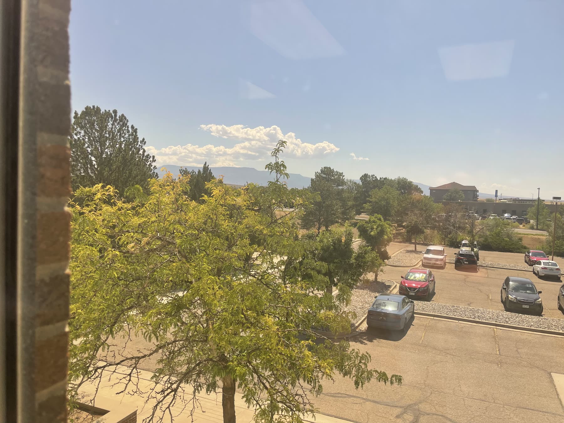 View from Suite 201 over the parking lot toward the Grand Mesa